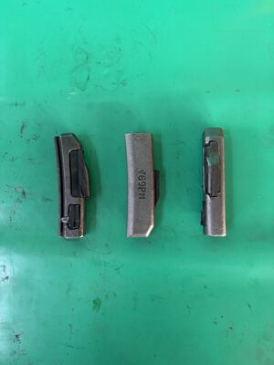 Pezzi di ricambio per escavatore Denti della benna Accessori Perno di bloccaggio adattatore V69PN